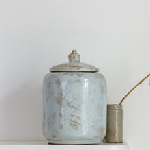 Load image into Gallery viewer, Large ceramic jar with a smaller cylindrical container on a white surface with a light gray background