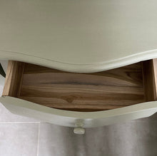 Load image into Gallery viewer, Open wooden drawer with a light-colored wooden surface above it on a neutral background