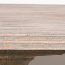 Load image into Gallery viewer, A beautifully handcrafted 240cm dining table made from solid mango wood, featuring a light rustic finish and two detailed hand-carved columned pedestal legs.