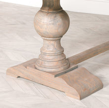 Load image into Gallery viewer, A beautifully handcrafted 240cm dining table made from solid mango wood, featuring a light rustic finish and two detailed hand-carved columned pedestal legs.