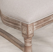 Load image into Gallery viewer, Elegant and timeless, this Wooden Louis Dining Chair features a carved birch frame with a subtle wood wash, a rattan square back, and a linen-upholstered seat, and is conveniently stackable.