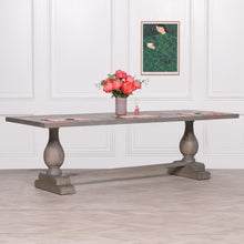 Load image into Gallery viewer, A handcrafted 260cm rectangular dining table made from solid mango wood, featuring a rustic finish with a subtle grey wash and elegant hand-carved columned pedestal bases.
