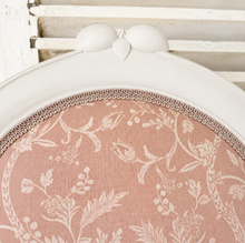 Load image into Gallery viewer, Round pink fabric with floral pattern on a white background